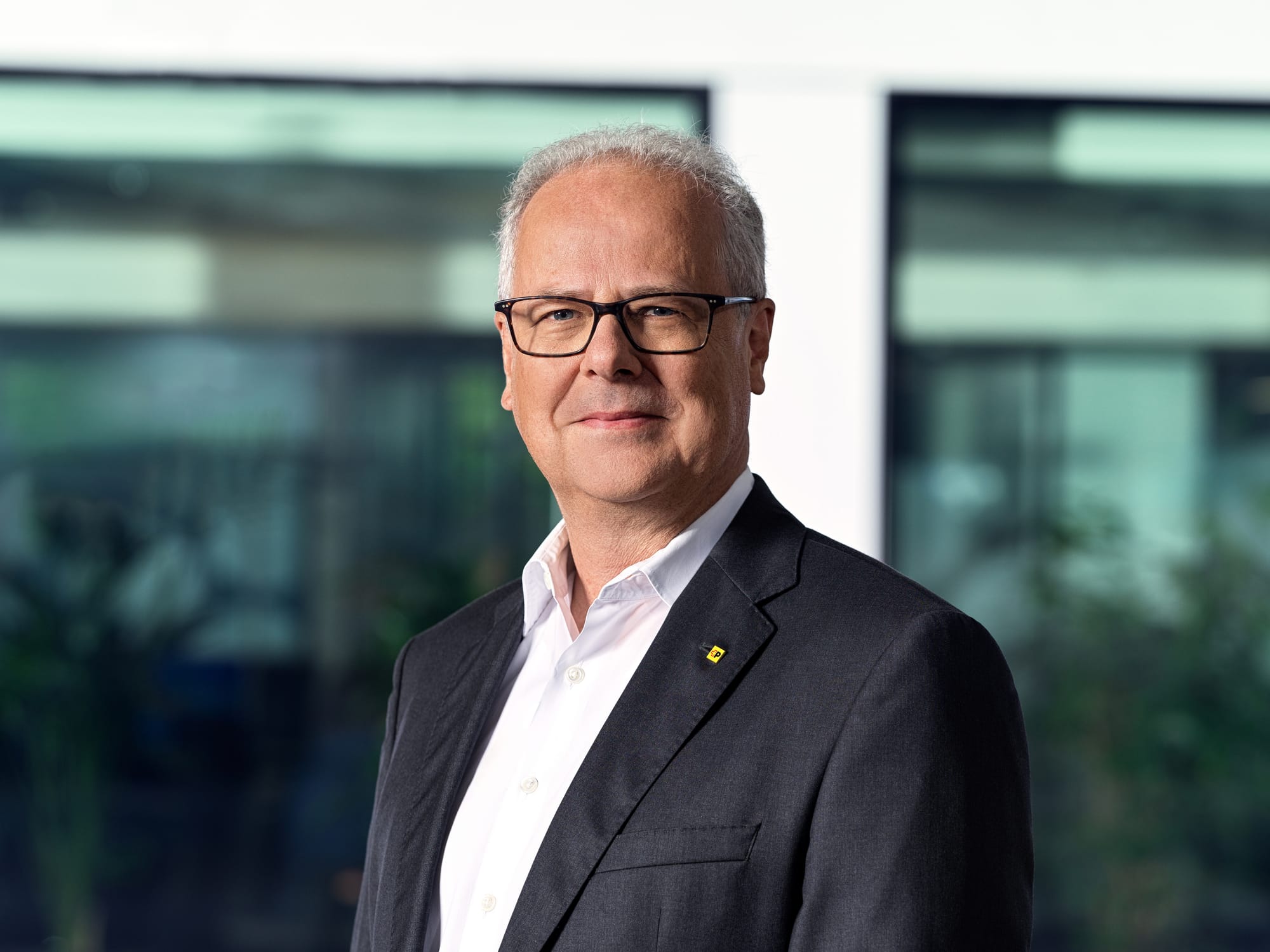 Portraitfoto von Wolfang Eger - CIO der Post